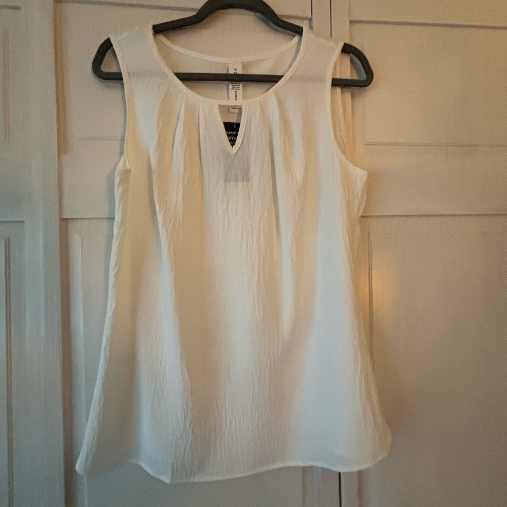 Chic Cream Sleeveless Blouse